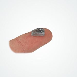 Clamcleat® CL24 very small alloy insert cleat shown on a finger tip